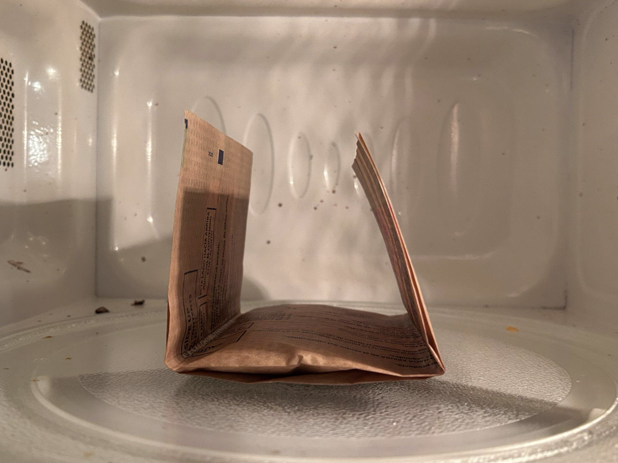 Unfolded paper bag with warnings