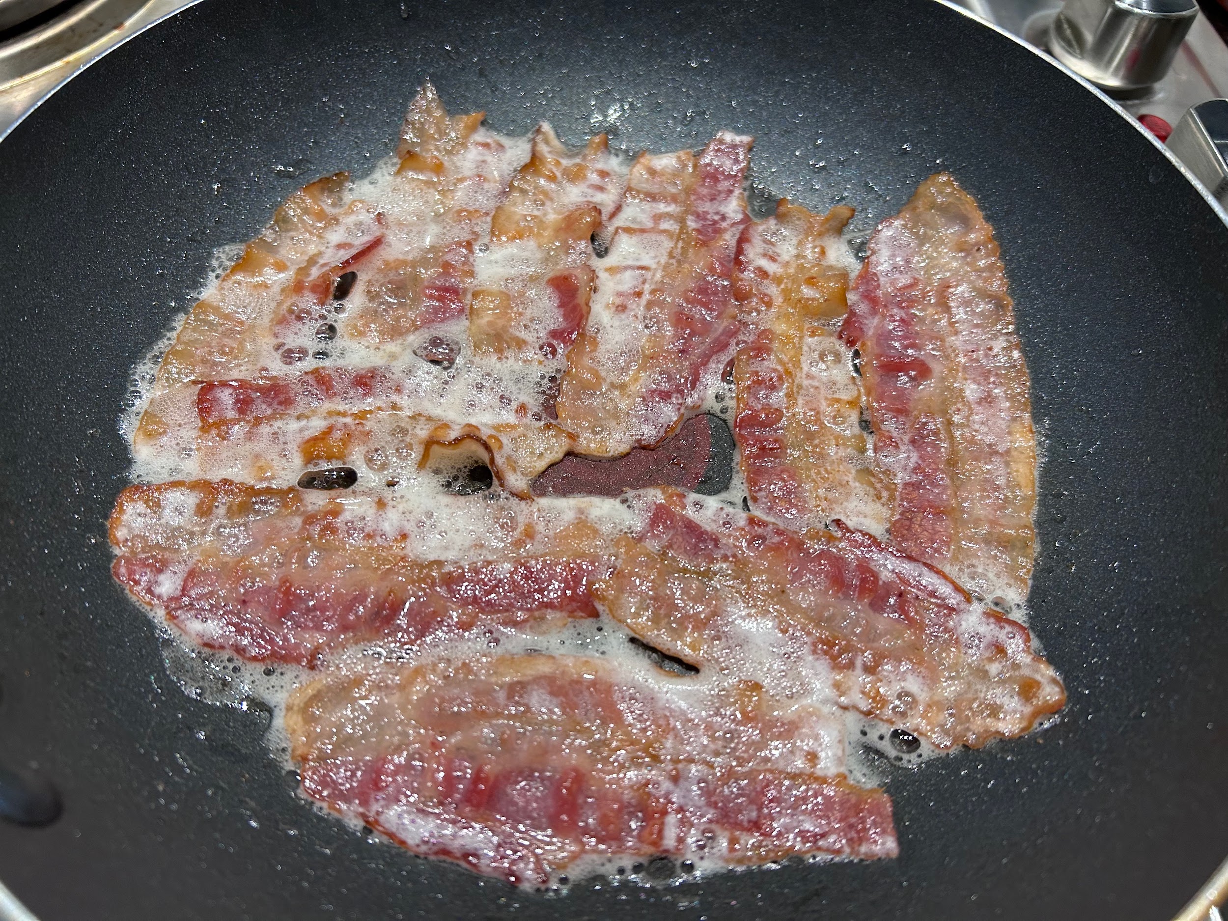 Kirkland Signature fully cooked bacon pan-fried until crispy